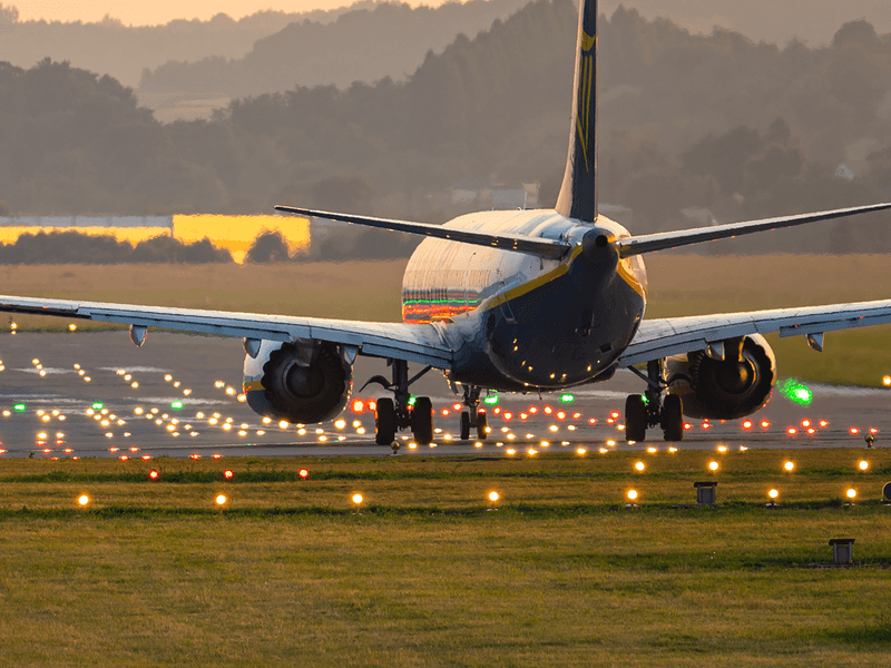 A plane landing on a runway